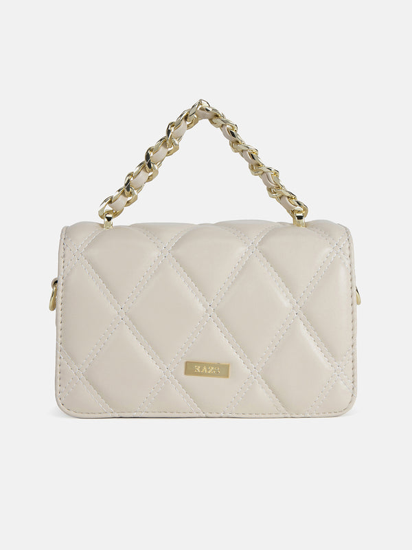 QUILTED SLING BAG WITH TWIST LOCK