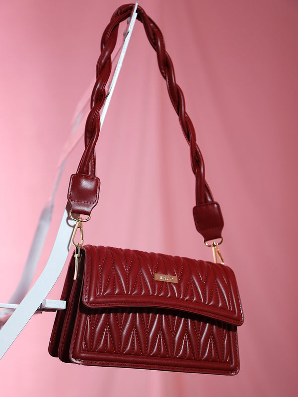Unique Quilting With Twisted Handle Handbag
