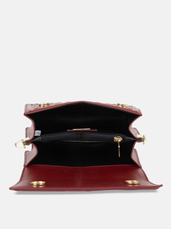 Unique Quilting With Twisted Handle Handbag