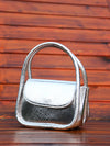 Round And Radiant Metallic Handbag