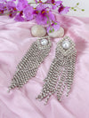 Oversized Pearl With Heavy Rhinestone Tassels.