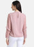 Top With Ruffles At Neck And Sleeves.